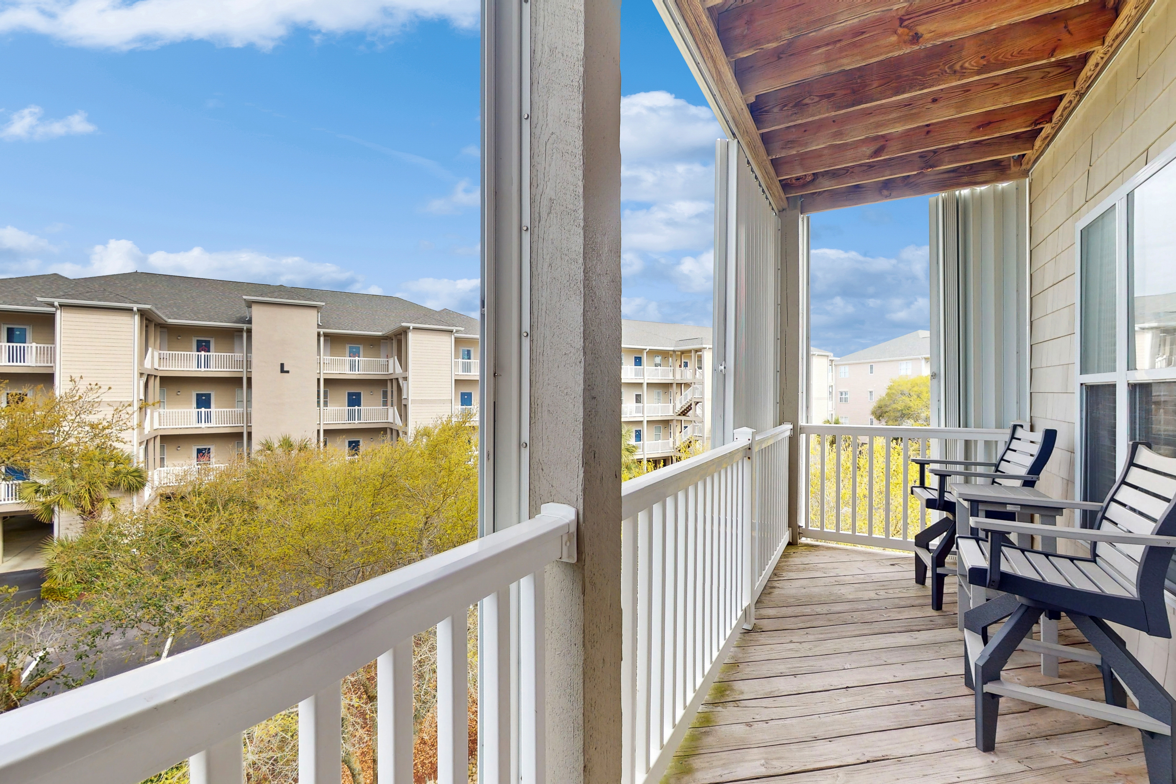 Sound side condo with sunset view balcony - close to pool, hot tub, and pier