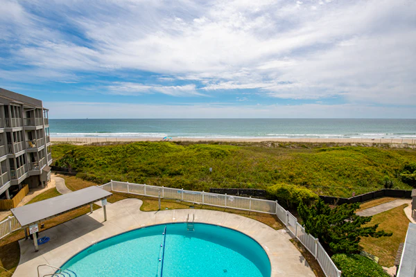 3rd-Floor Condo in Oceanfront Building w/Ocean Views, Shared Pool, Free WiFi
