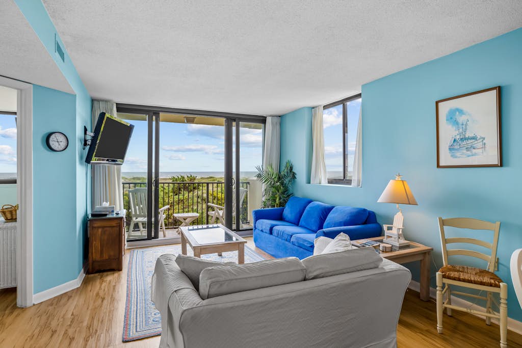 Ocean view condo with pool, sauna, gym, and tennis courts - walk to the beach