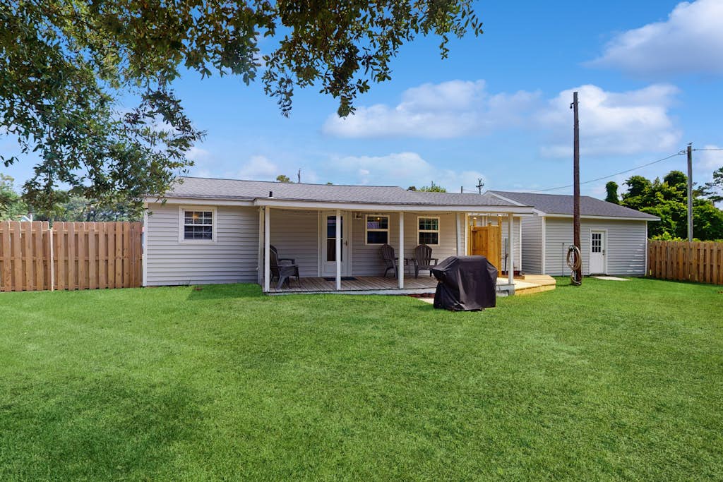 Dog-friendly coastal home with enclosed yard and boat parking available