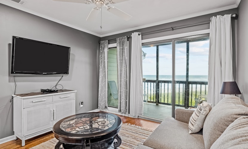 Modern waterfront gem with pools, direct beach access, WiFi & balcony