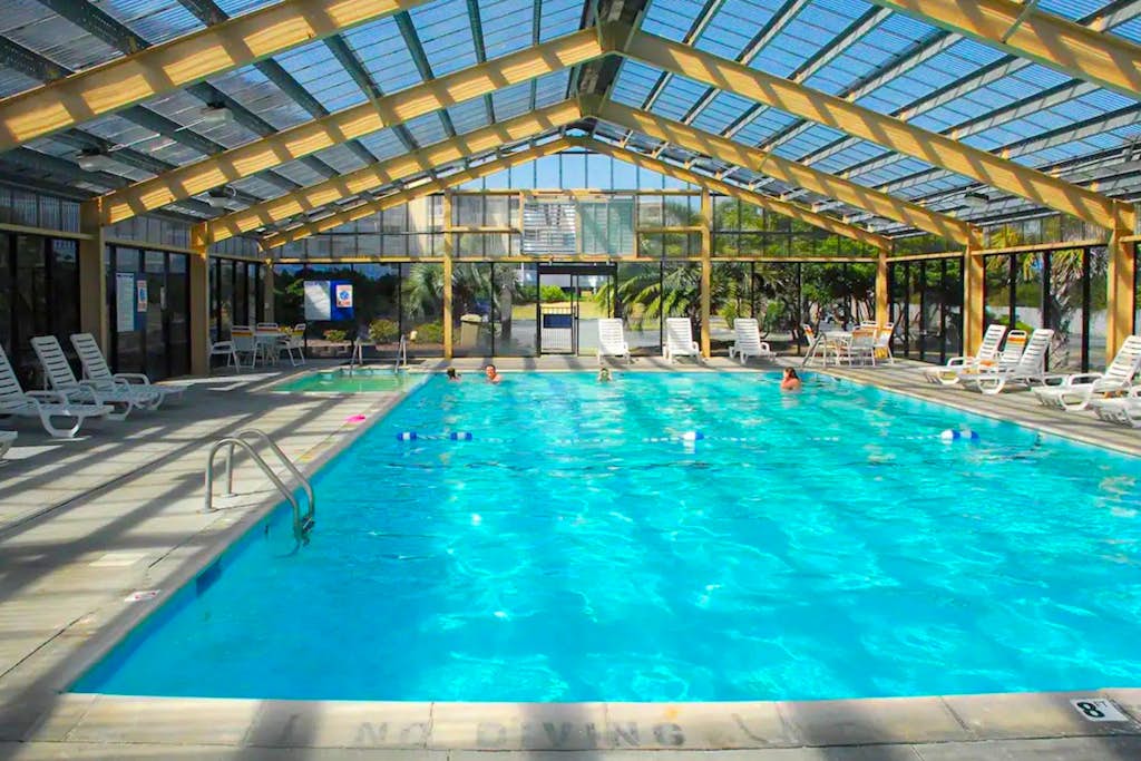 Ocean View Courtyard Condo with Balcony & Shared Pools/Hot Tub/Putt-Putt/Tennis