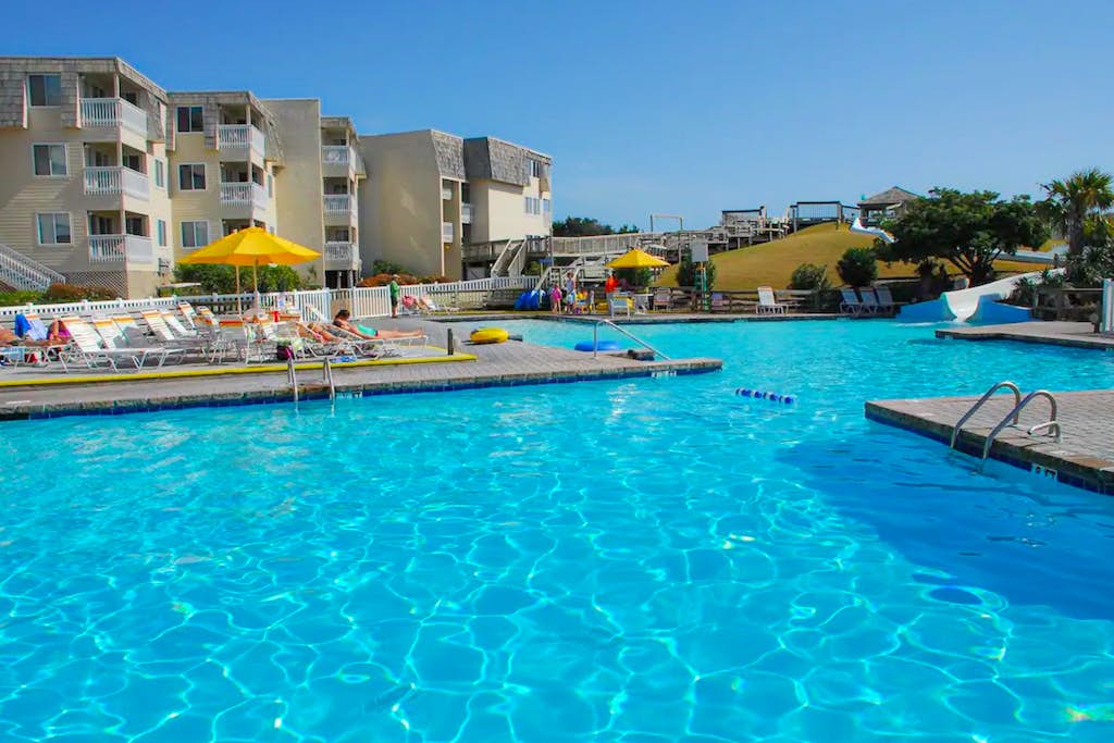 Ocean View Courtyard Condo with Balcony & Shared Pools/Hot Tub/Putt-Putt/Tennis