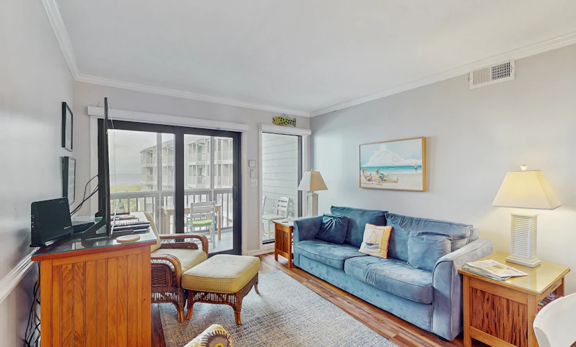 Oceanfront condo with shared pool, dock, grill, private balcony, & washer/dryer