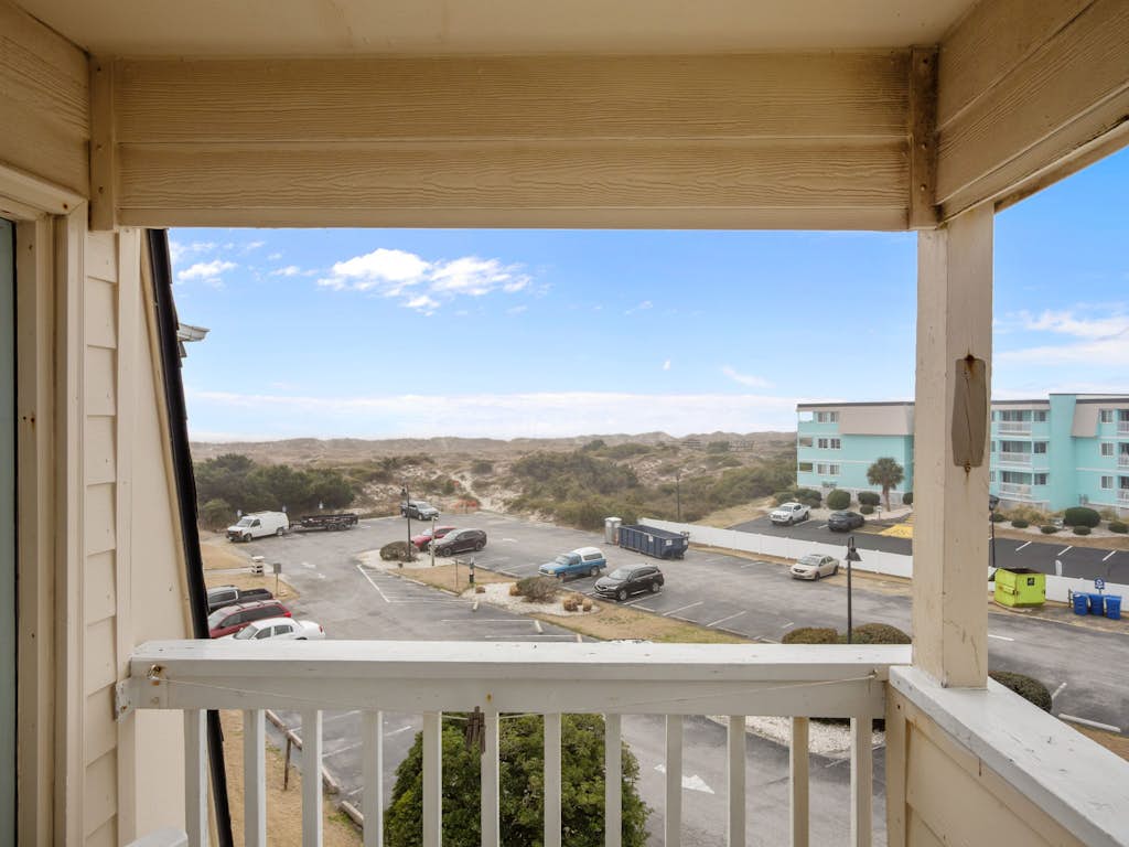 Beachfront home with ocean-view balcony, two pools, waterslide, & beach access