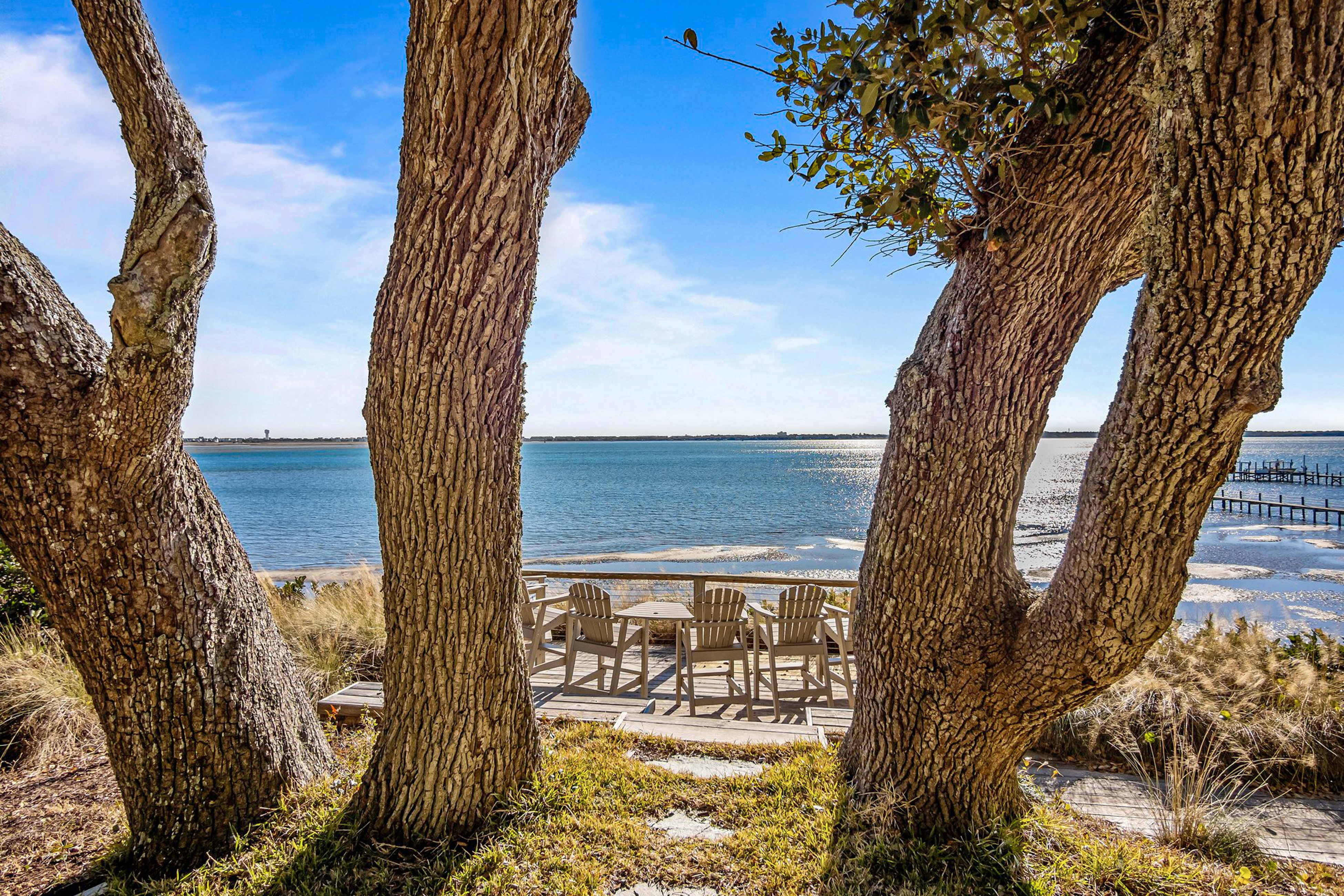 Three dog-friendly, waterfront cottages with full kitchens & private beach