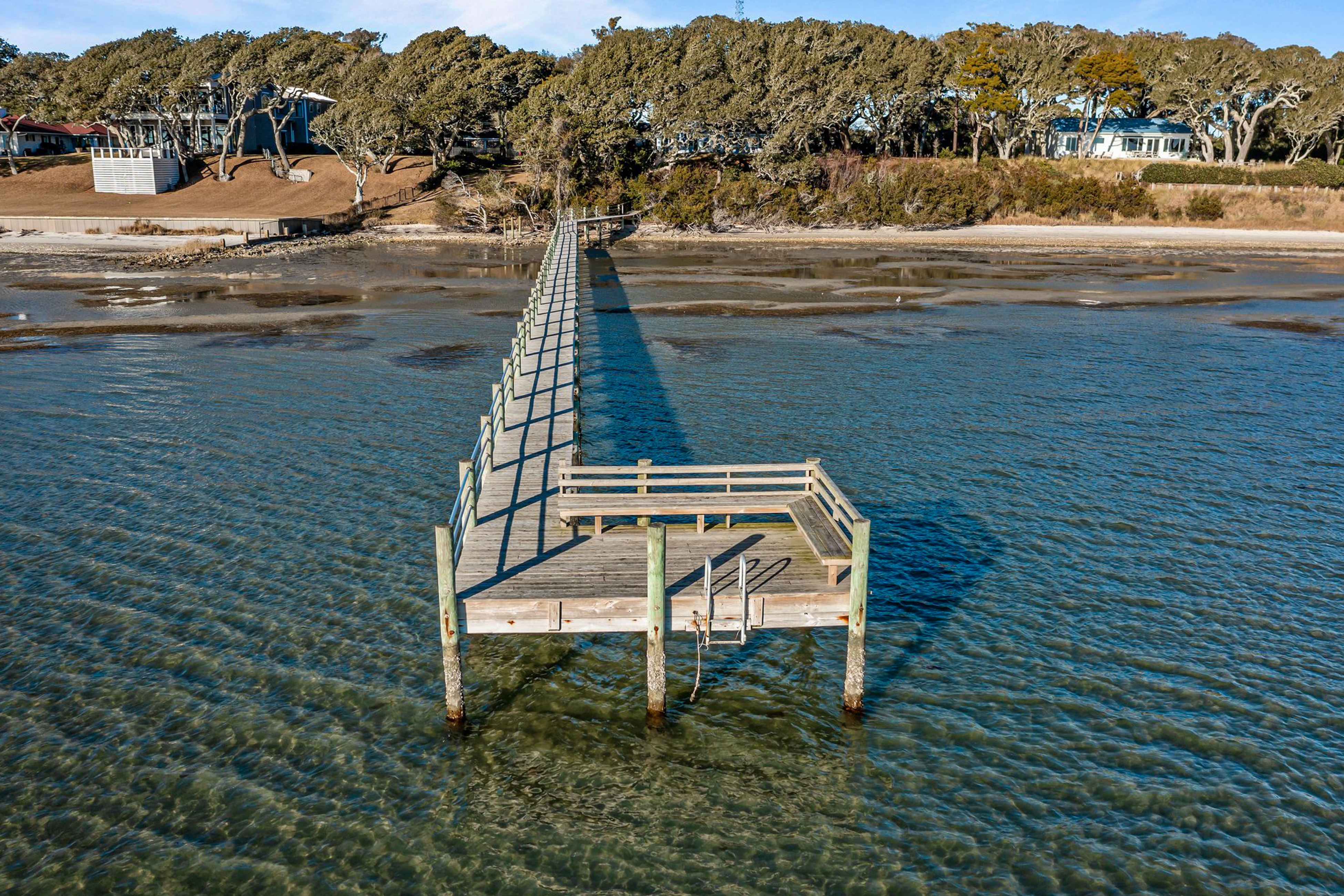 Three dog-friendly, waterfront cottages with full kitchens & private beach