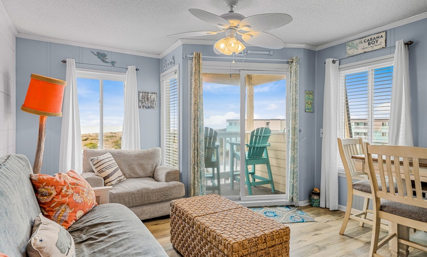 Beachfront home base with ocean-view balcony, 2 pools, waterslide & beach access