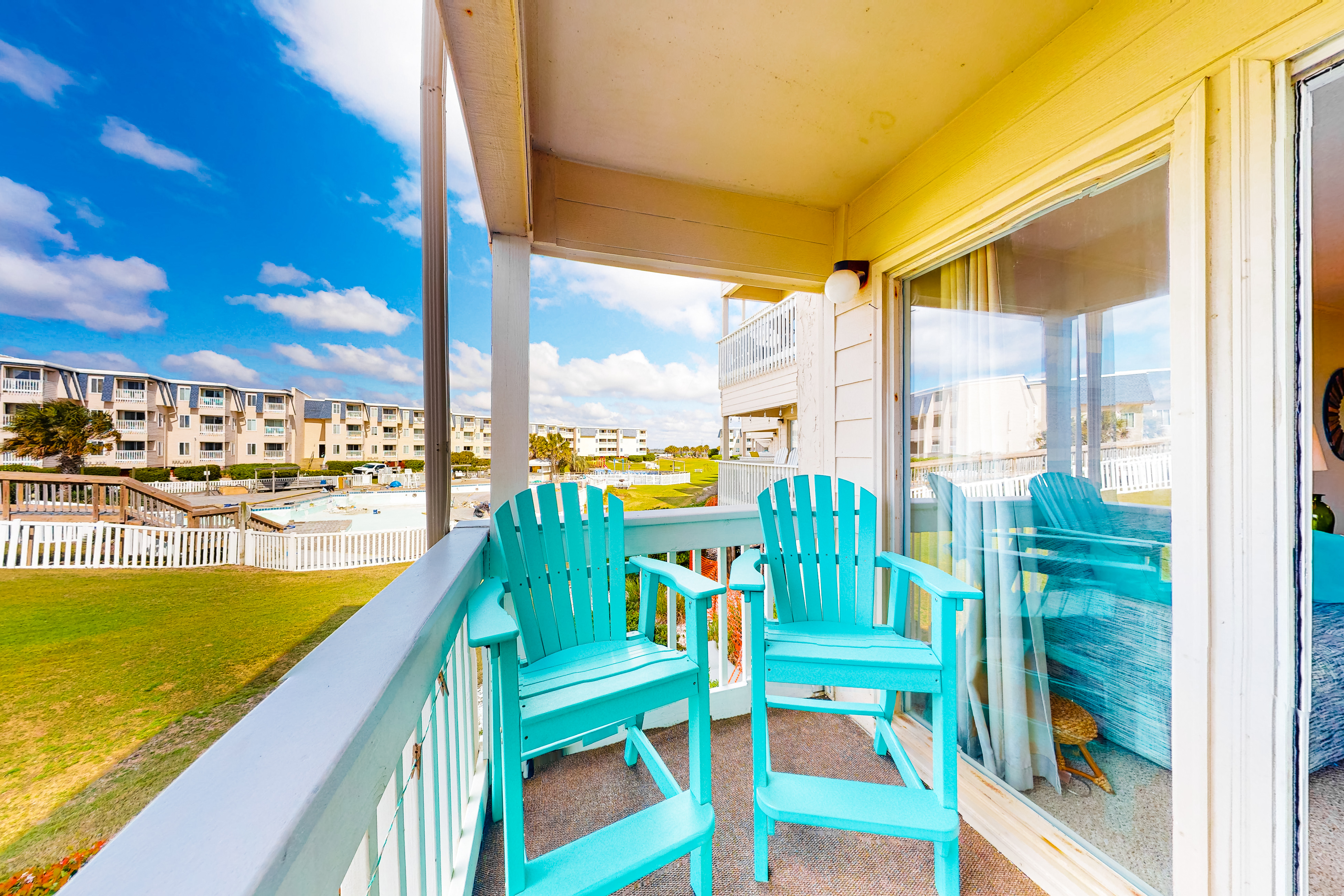 First-floor condo overlooking the courtyard with shared pools/hot tub/tennis
