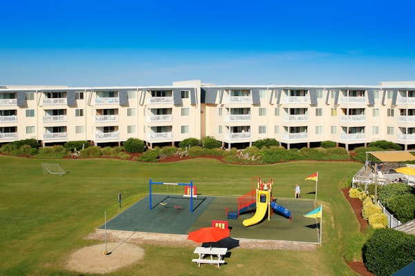 First-floor condo overlooking the courtyard with shared pools/hot tub/tennis