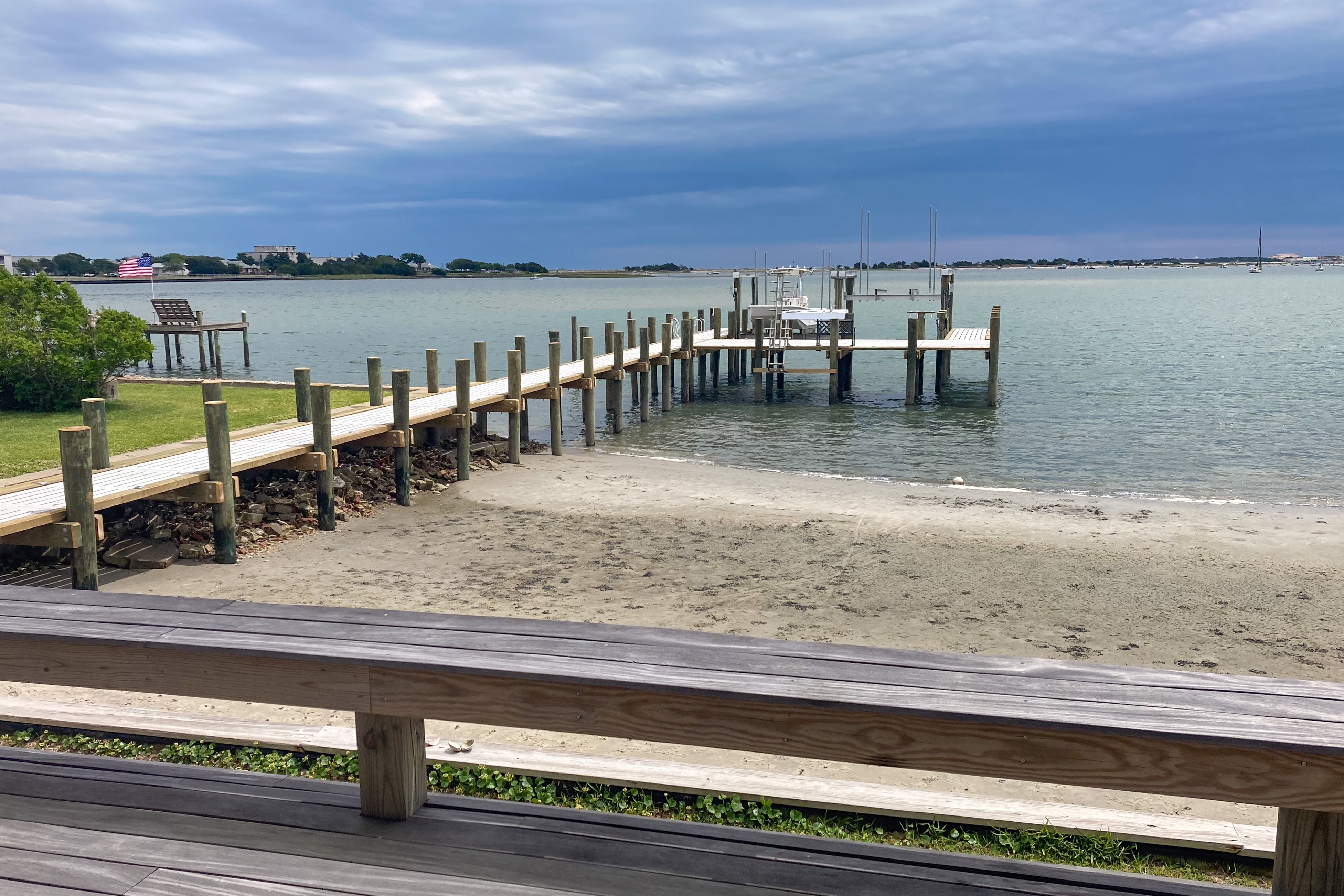 Stunning beachfront home with private dock, central AC & spacious deck