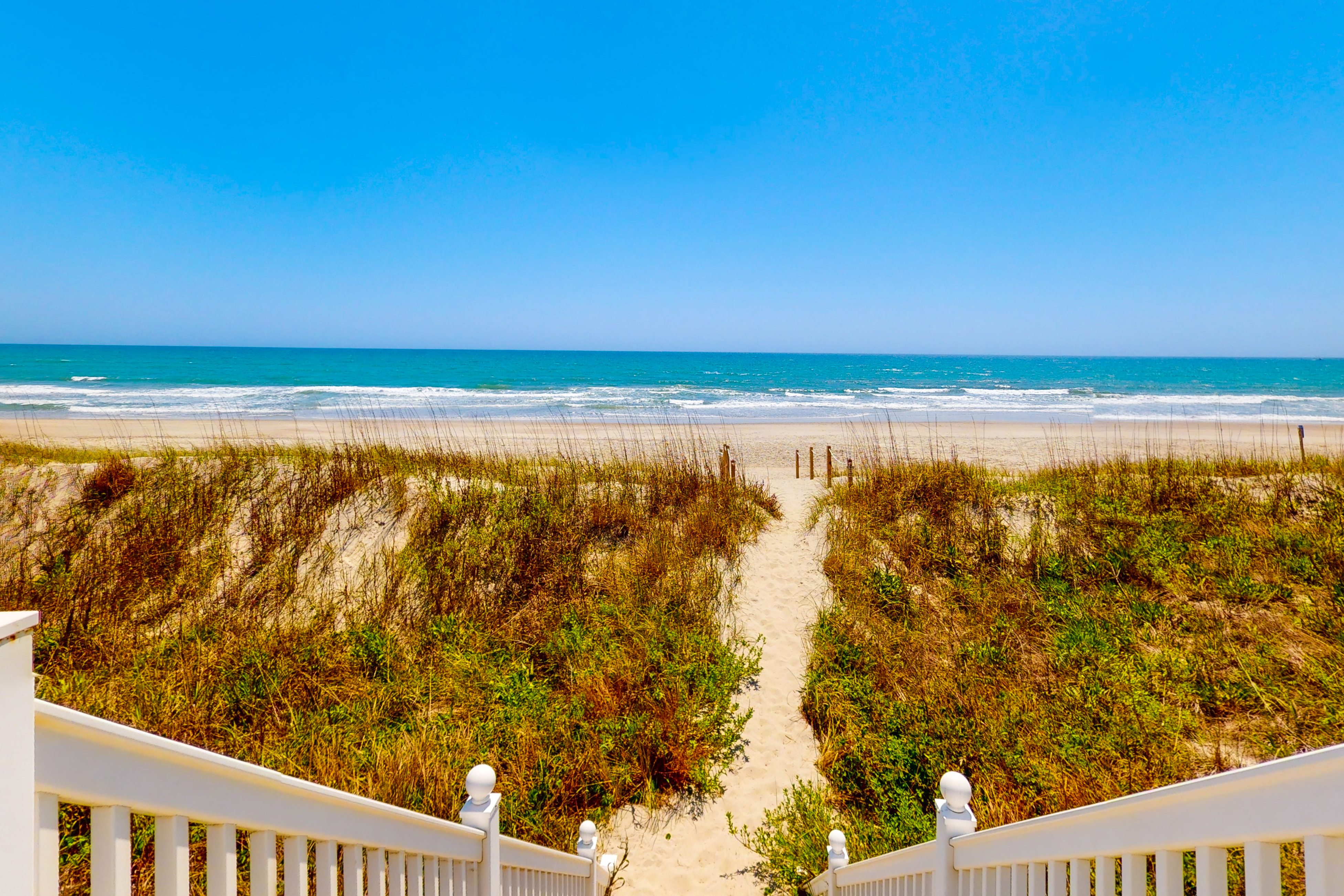 Oceanfront, 1st-Floor Condo with Deck, Ocean Views, WiFi, W/D & Shared Pool