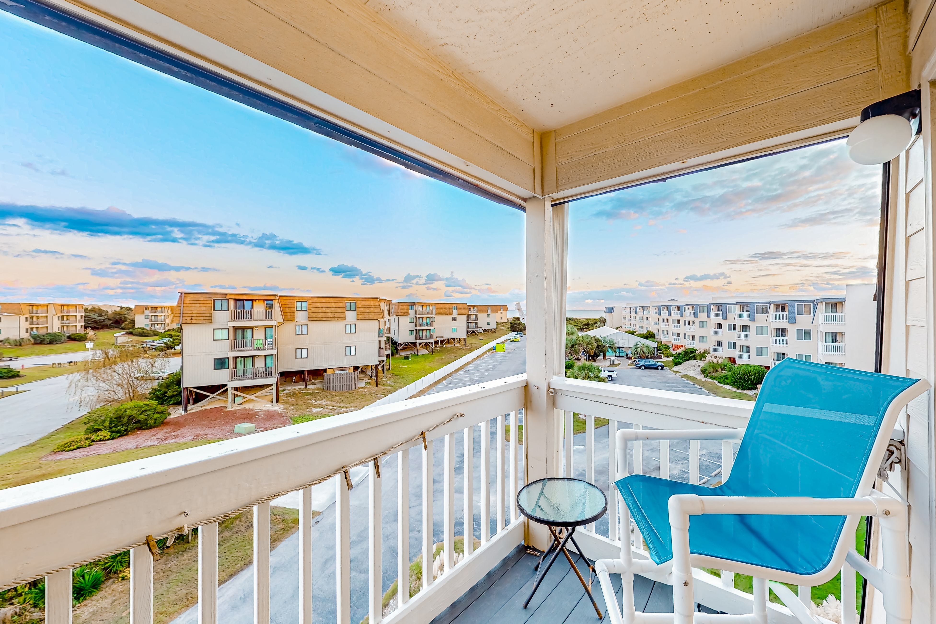 Ocean-view condo with pool, hot tub, sports courts, beach access, & balcony