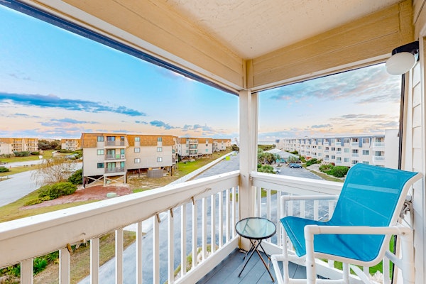 Ocean-view condo with pool, hot tub, sports courts, beach access, & balcony