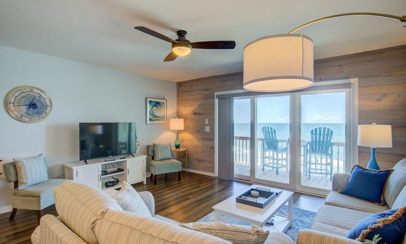 Beachfront condo with beach views, private beach access, community pool, gazebo