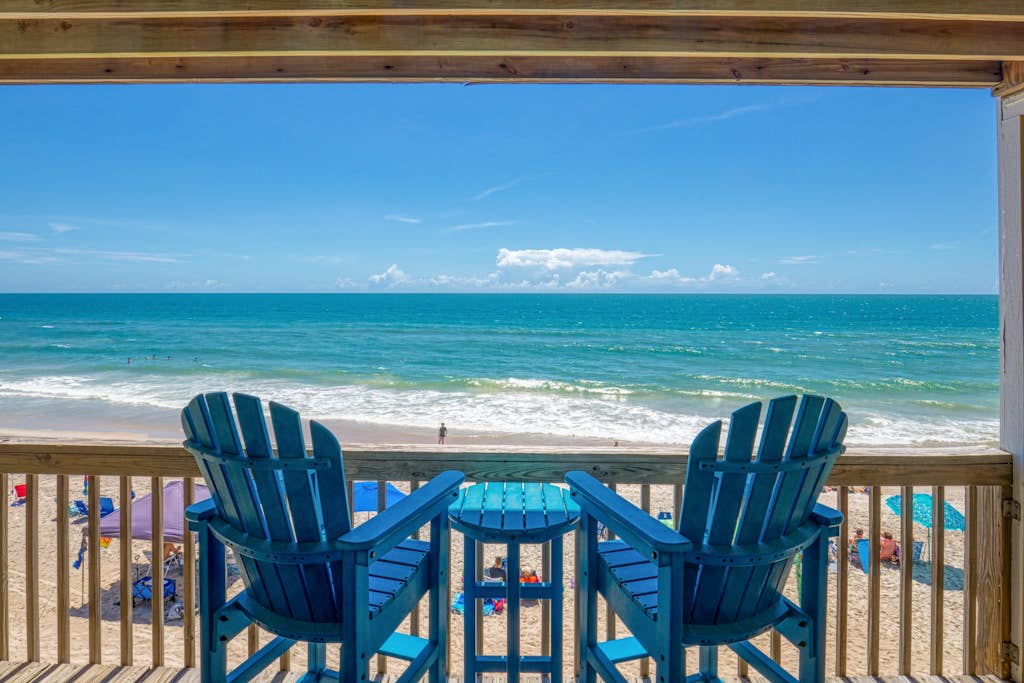 Beachfront condo with beach views, private beach access, community pool, gazebo