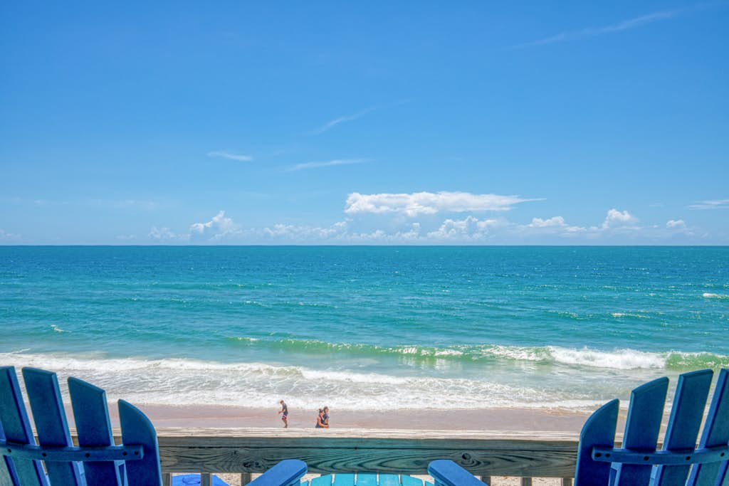 Beachfront condo with beach views, private beach access, community pool, gazebo