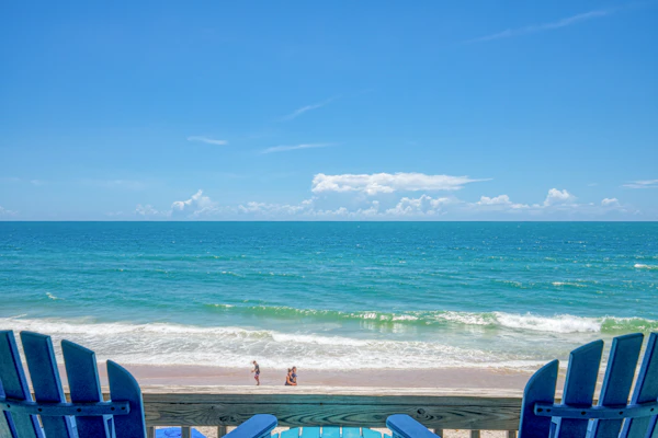 Beachfront condo with beach views, private beach access, community pool, gazebo