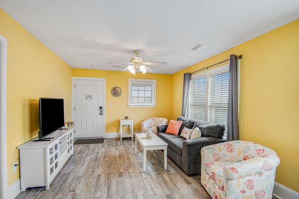 Dreamy ocean-view suite with pool, central AC, full kitchen, patio, & balcony