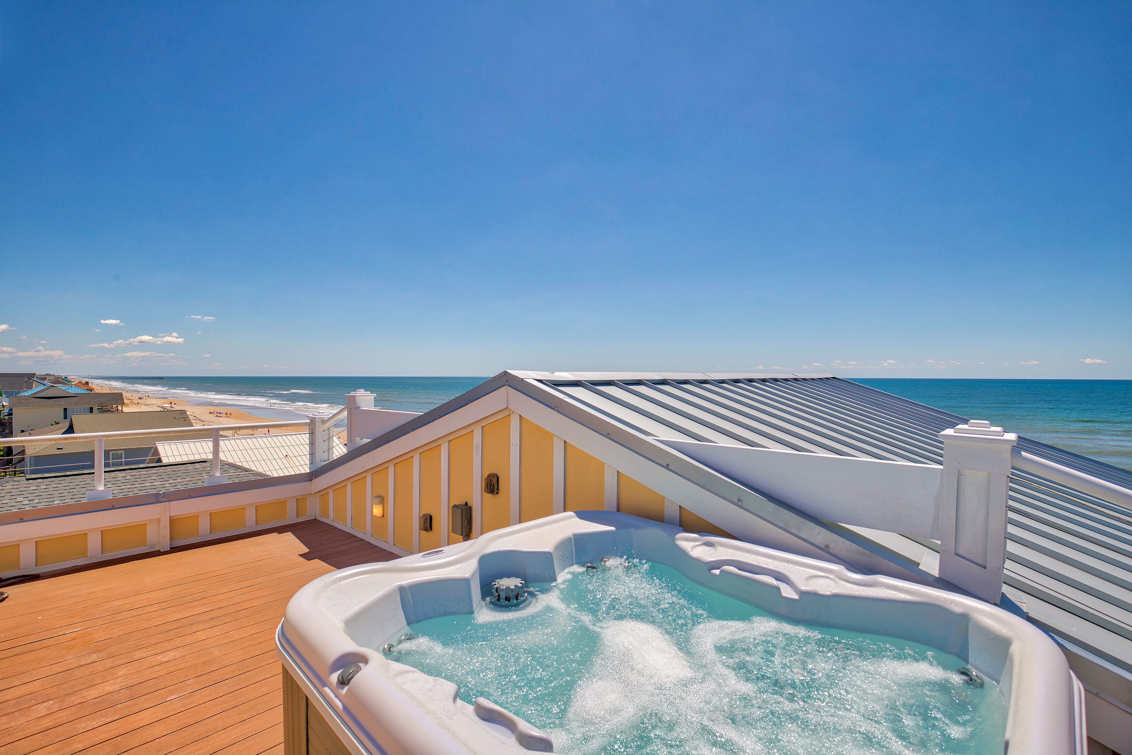 Beachfront home with beach access, private hot tub, pool, elevator, & game room