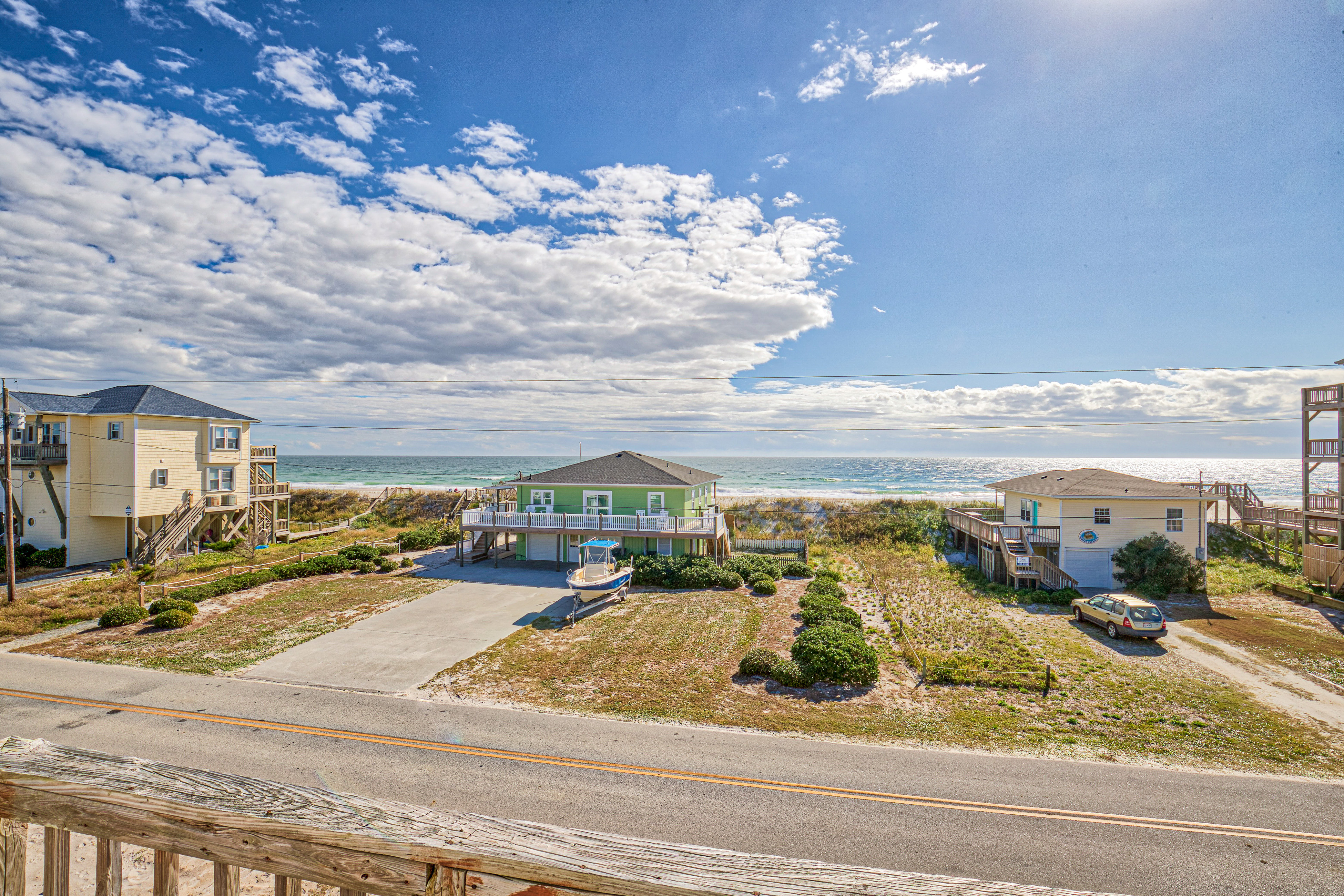 Dog-friendly home with ocean views, beach access, washer/dryer & central AC