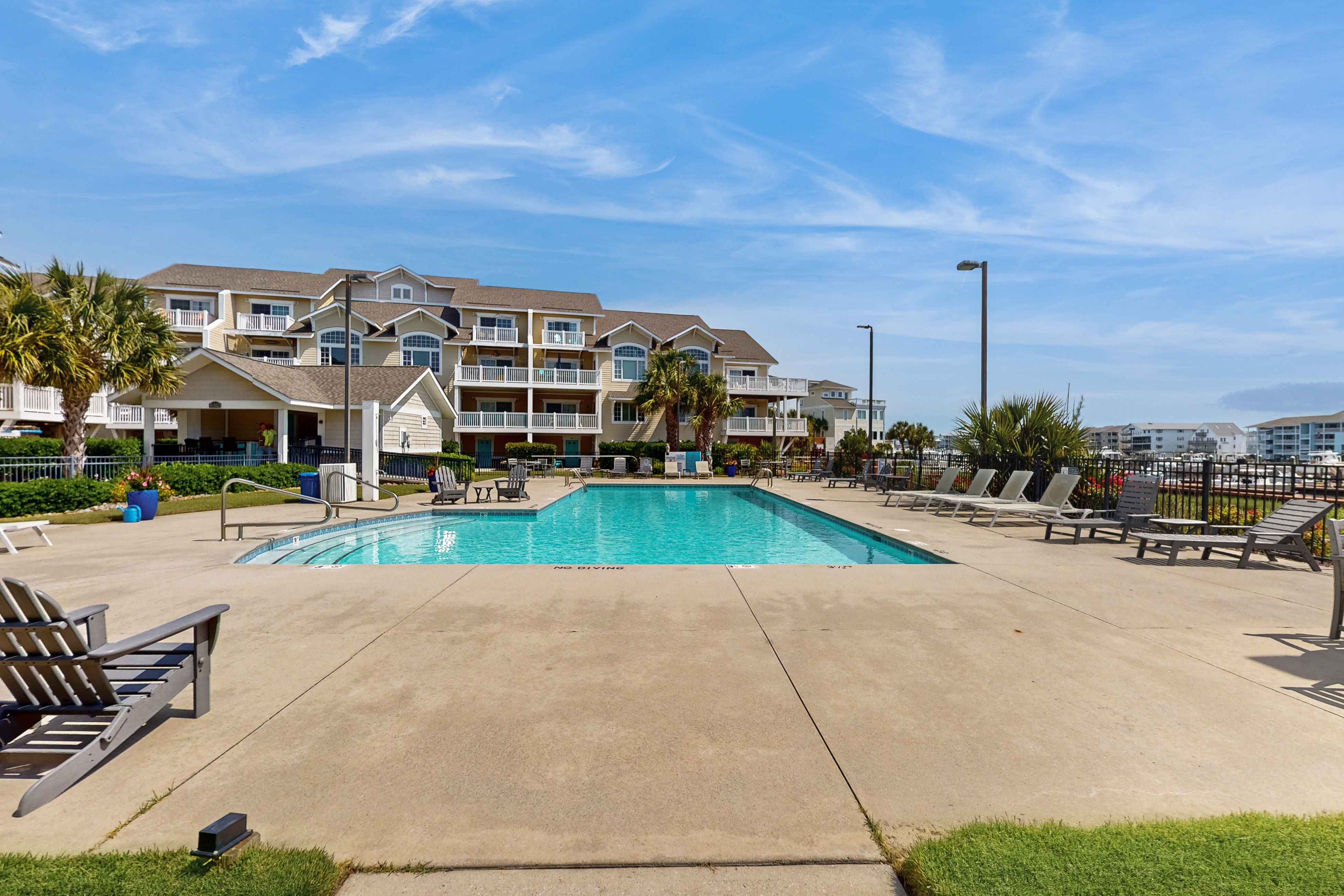 Stylish Coastal Condo w/ Pool & Balcony - Walk to the Beach