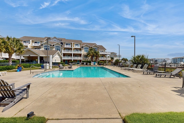 Stylish Coastal Condo w/ Pool & Balcony - Walk to the Beach