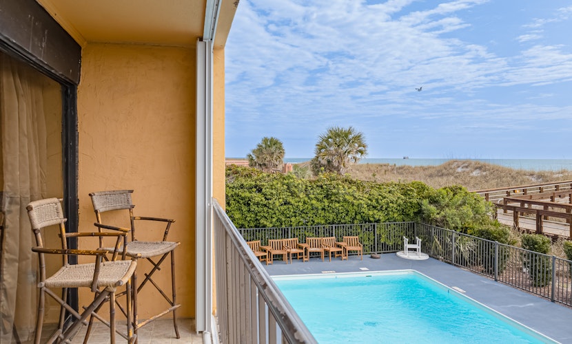 Oceanfront condo with great view, fast WiFi, & central AC - steps to the beach