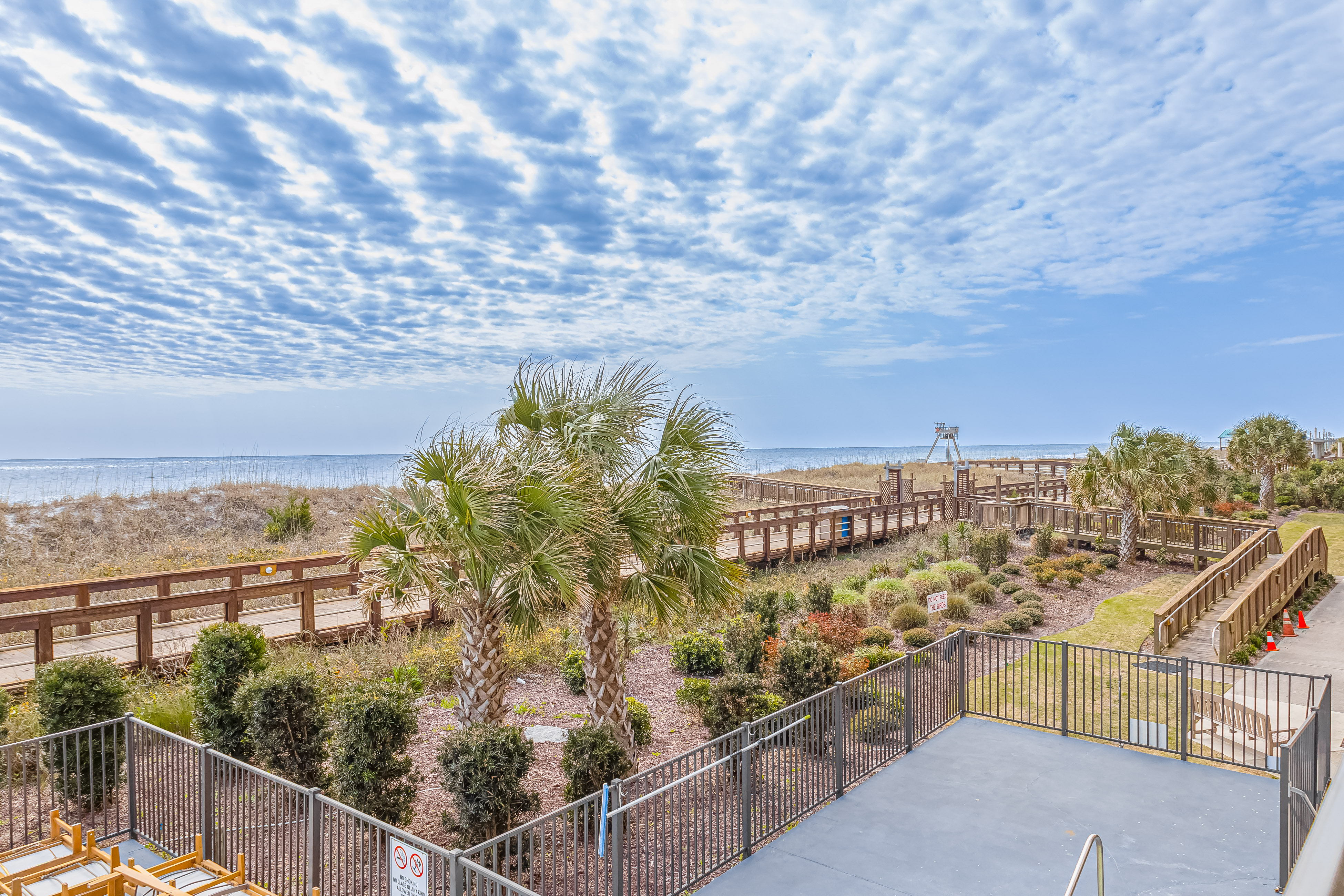 Oceanfront condo with great view, fast WiFi, & central AC - steps to the beach