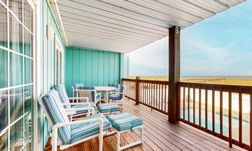 Dog-friendly, oceanfront condo with shared pool and beach access