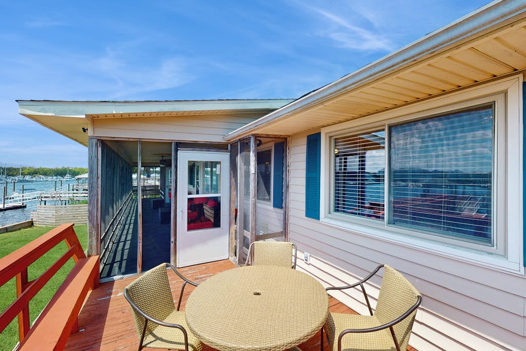 Beautiful waterfront home with private deck and large yard near beach access