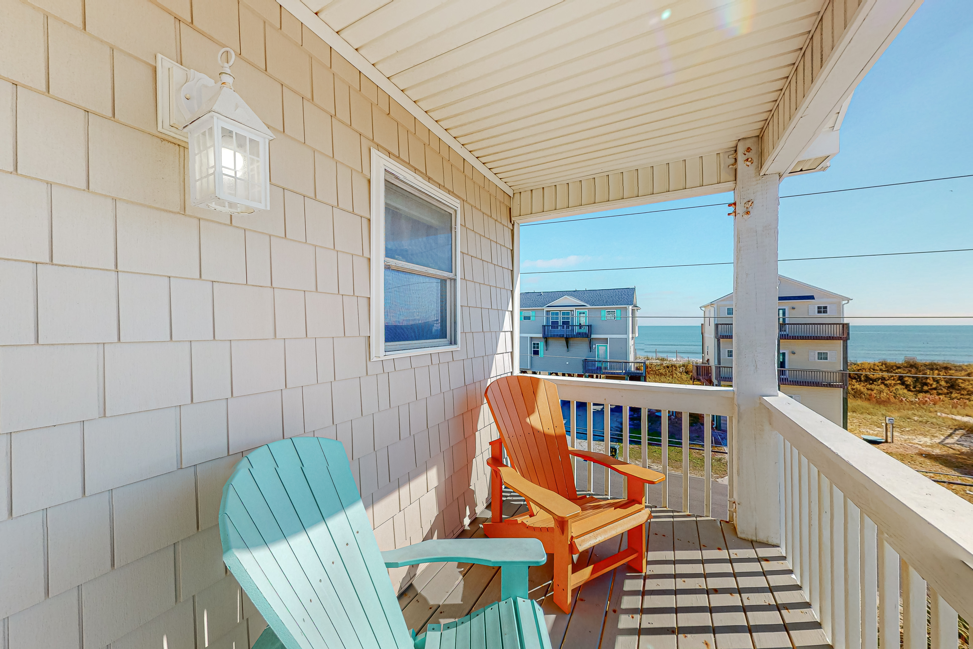 Ocean view duplex with beach access, a washer/dryer, central AC & golf nearby