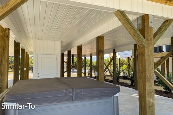 Stunning new build home with shared pool and private hot tub, close to beach