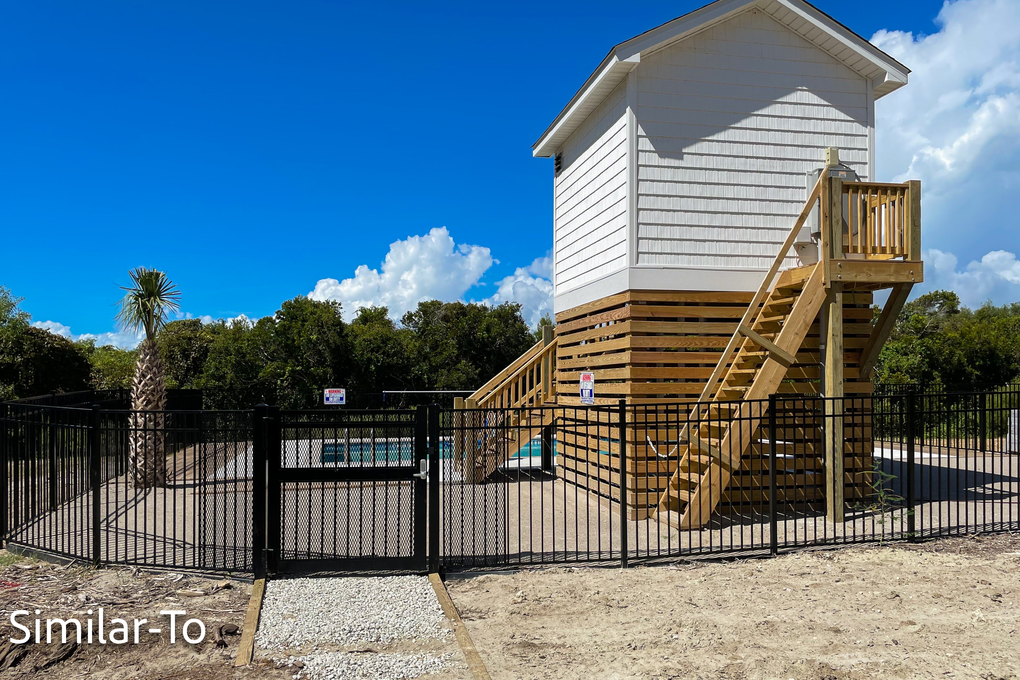 Stunning new build home with shared pool and private hot tub, close to beach