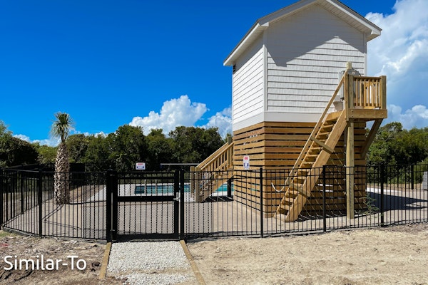 Stunning new build home with shared pool and private hot tub, close to beach