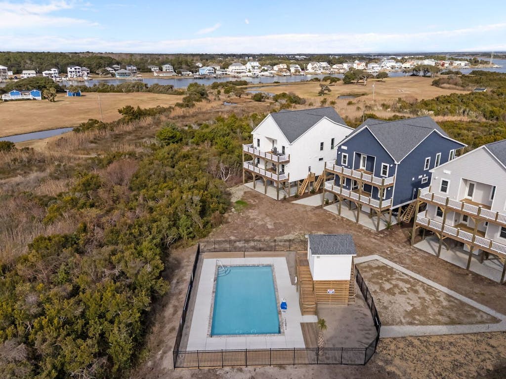 Stunning new build home with shared pool, close to beach