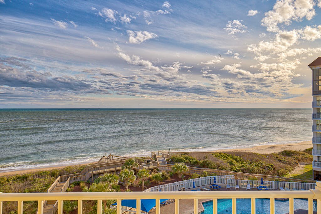 St. Regis beachfront condo with ocean & pool-view balcony, gym & sauna