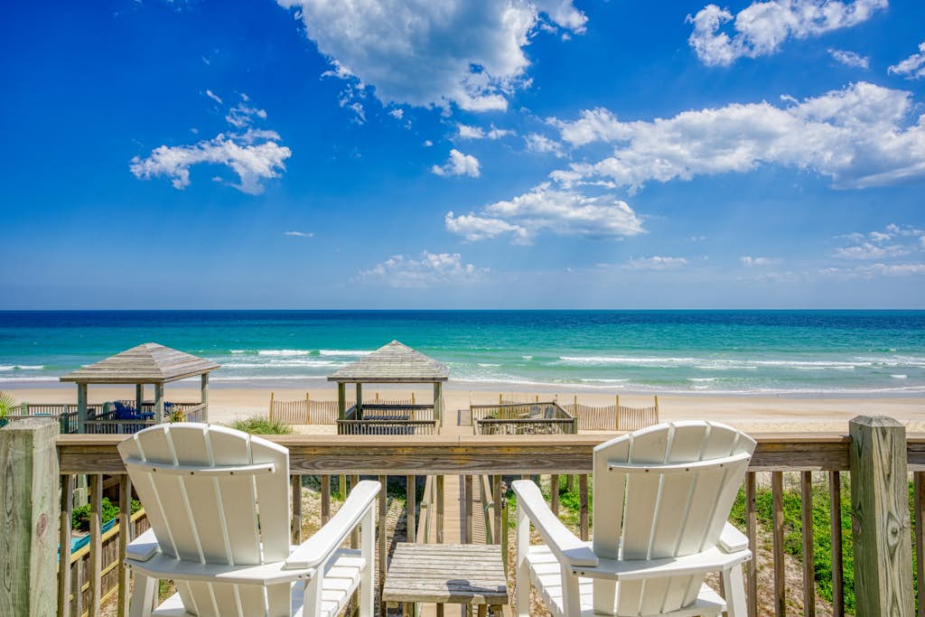 Oceanfront home with beach access, washer/dryer, central AC & golf nearby