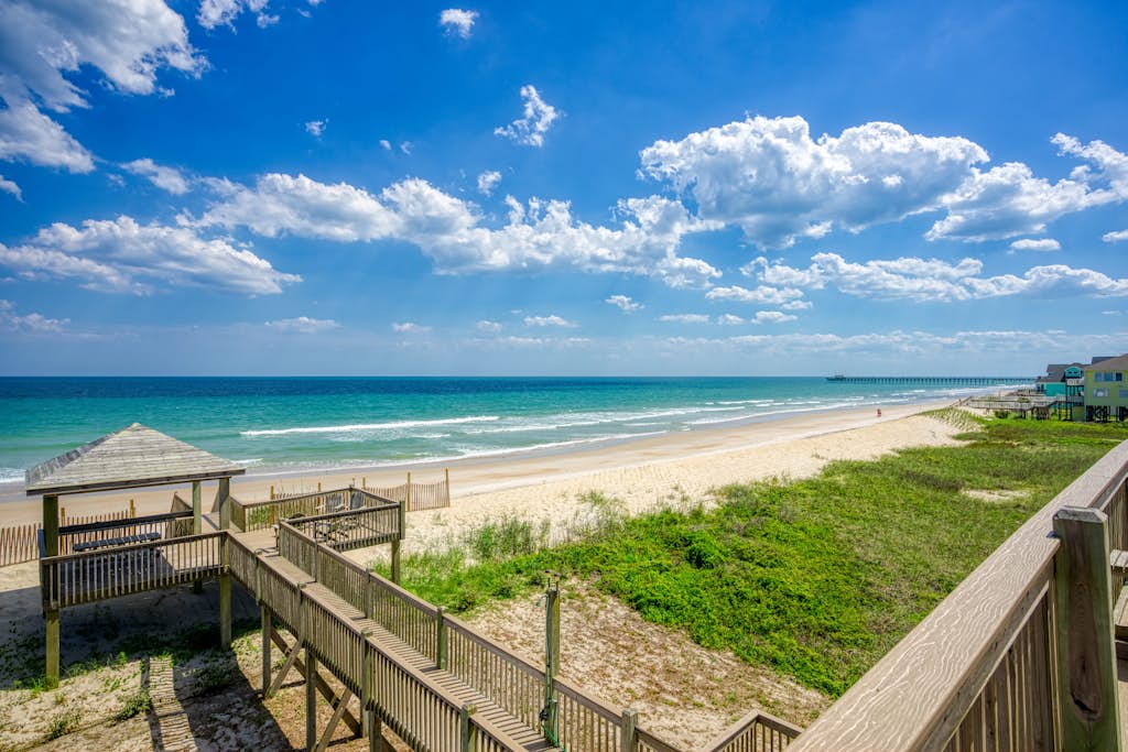 Oceanfront home with beach access, washer/dryer, central AC & golf nearby