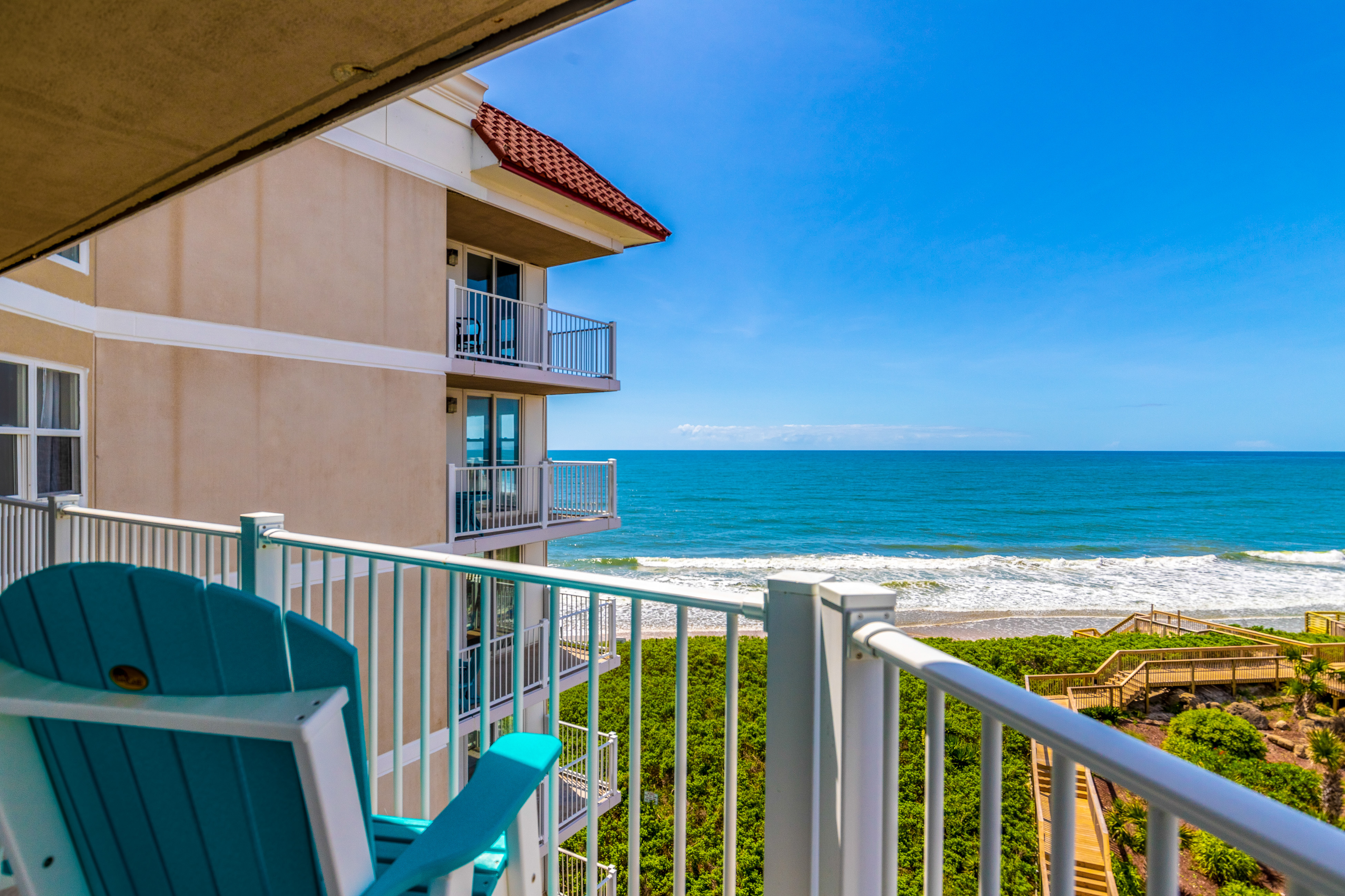 Beach condo with ocean- & pool-view balcony & custom upgrades throughout