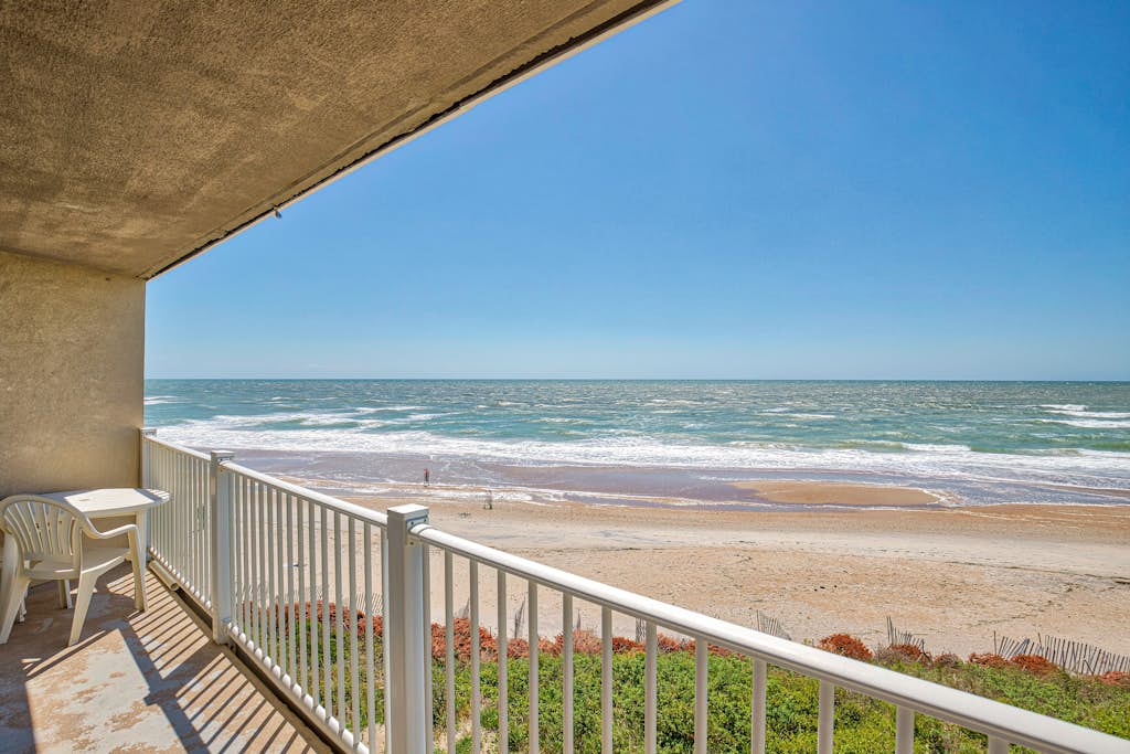 Oceanfront St. Regis condo with resort pool, gym, arcade & beach access