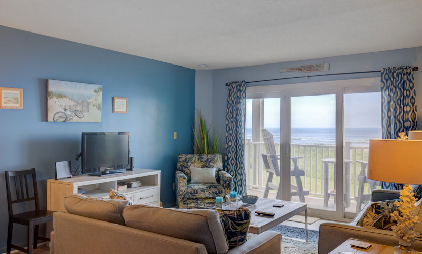 Beachfront condo with private beach access, balcony, on-site pool, tennis & AC