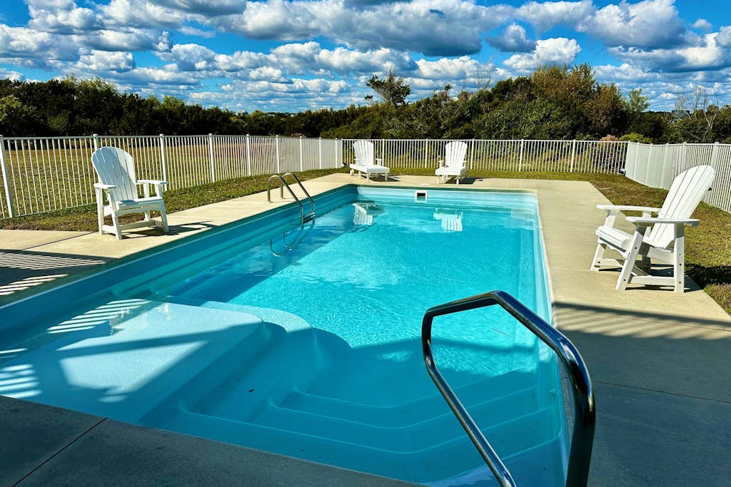 Dog-friendly sound- & beach-view home with private heated pool, decks, AC & W/D
