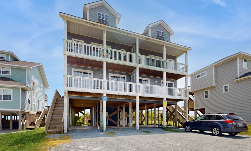 Oceanfront duplex with 4 decks, private beach walkway, central AC, & W/D