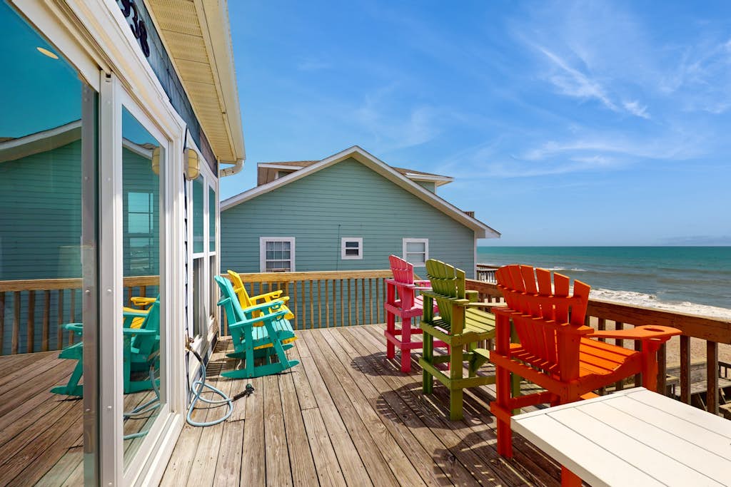 Oceanfront duplex with 4 decks, private beach walkway, central AC, & W/D