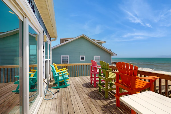 Oceanfront duplex with 4 decks, private beach walkway, central AC, & W/D