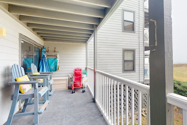 Ocean-view condo with elevator, balcony, W/D, community outdoor pool & grills