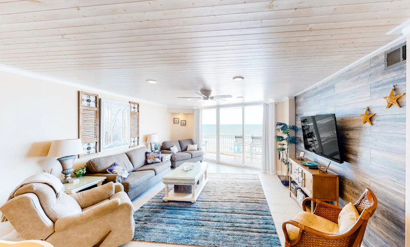 Beachfront condo with ocean views, pool, tennis, gym, balcony