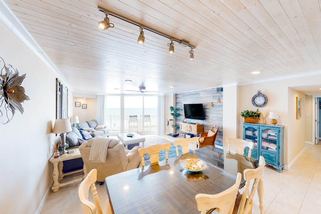 Beachfront condo with ocean views, pool, tennis, gym, balcony