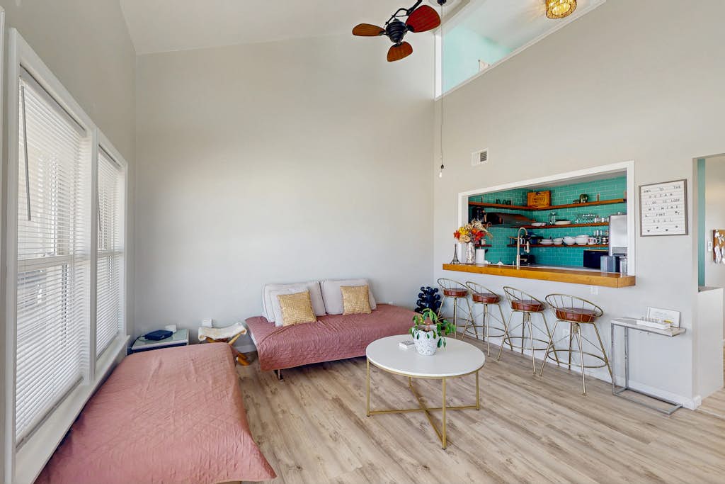 Updated home steps away from the beach with Outside Patio, Central A/C, and Wifi